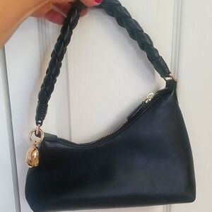 AUPEN Elegant Black Nirvana Handbag Favored by Celebrities!